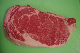 A raw beef steak